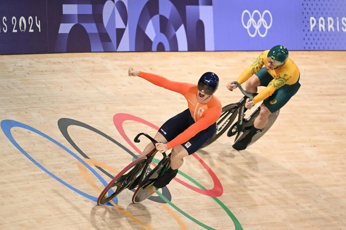 Netherlands' Harrie Lavreysen celebrates his win over Australia's Matthew Richardson in the Paris Olympics men's track cycling keirin final at the Saint-Quentin-en-Yvelines National Velodrome in Montigny-le-Bretonneux, on Aug 11, 2024.