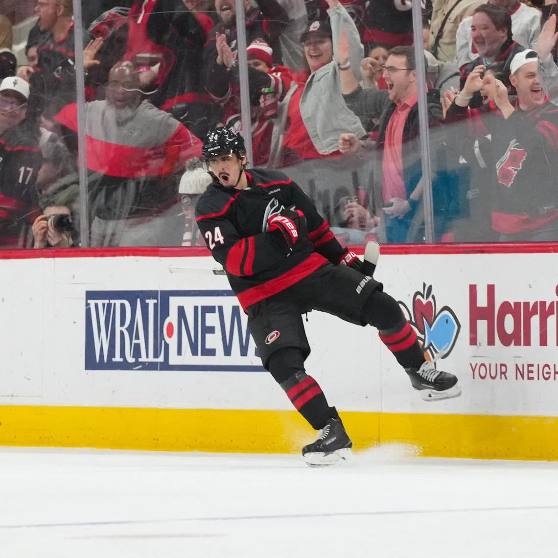 Feb 3, 2026; Raleigh, North Carolina, USA;  Carolina Hurricanes center Seth Jarvis (24) celebrates his goal against the Ottawa Senators during the second period at Lenovo Center. Mandatory Credit: James Guillory-Imagn Images