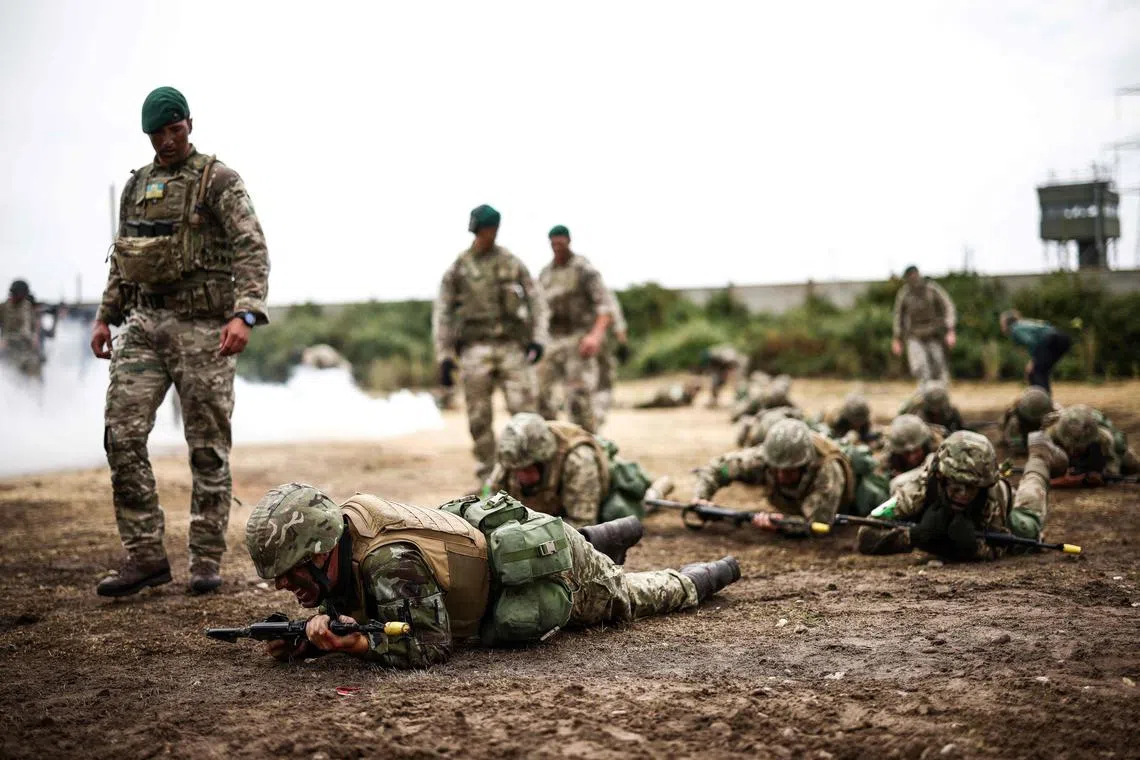 Ukrainian army recruits training in England in June. Manpower woes are a common Achilles’ heel for both Ukraine and Russia.