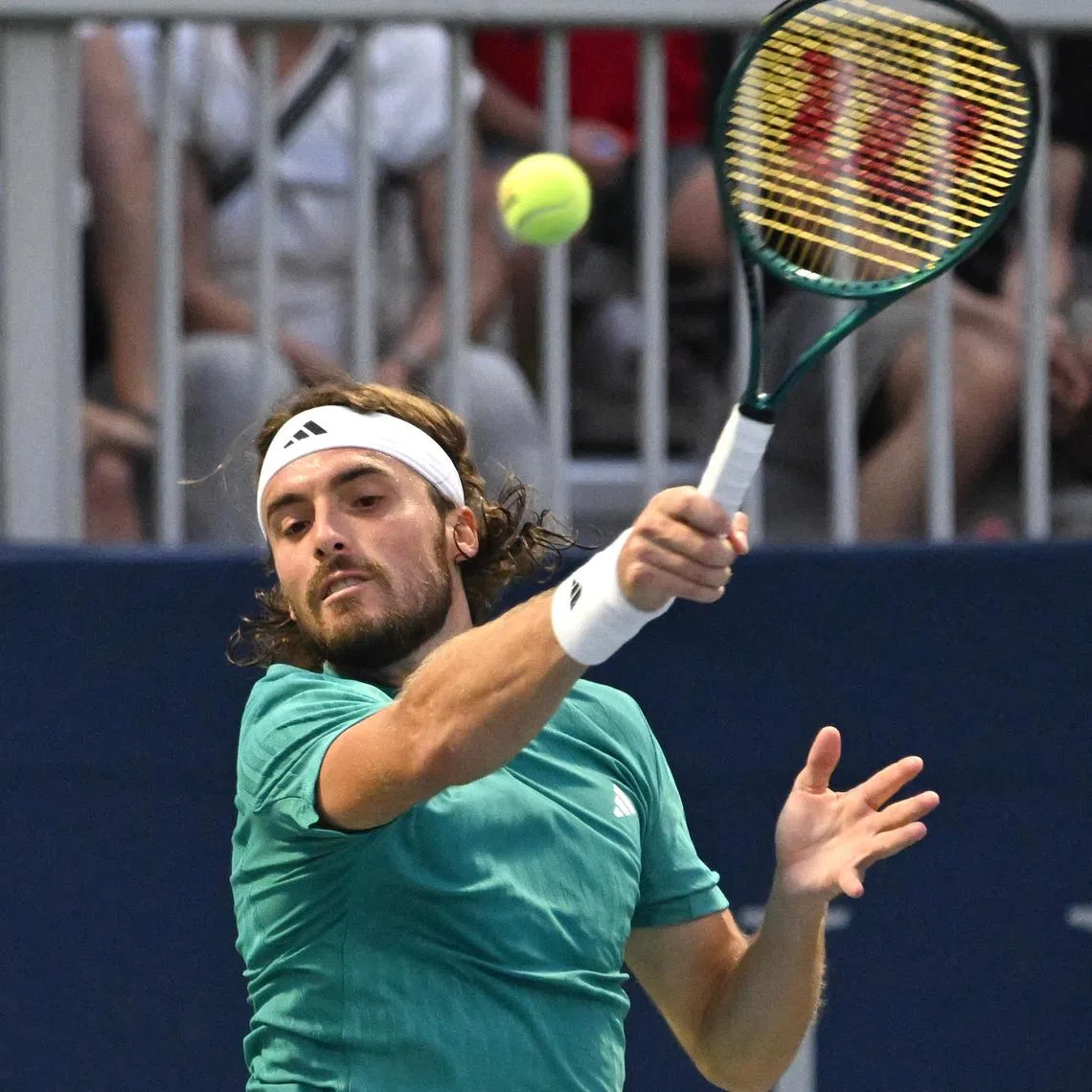 FILE PHOTO: Jul 30, 2025; Toronto, ON, Canada;  Stefanos Tsitsipas (GRE) plays a shot against Christopher O'Connell (AUS) during second round play at Sobeys Stadium. Mandatory Credit: Dan Hamilton-Imagn Images/File Photo