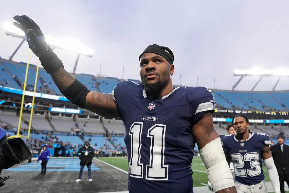 FILE PHOTO: Dec 15, 2024; Charlotte, North Carolina, USA; Dallas Cowboys linebacker Micah Parsons (11) walks off the field after the game at Bank of America Stadium. Mandatory Credit: Bob Donnan-Imagn Images/File Photo