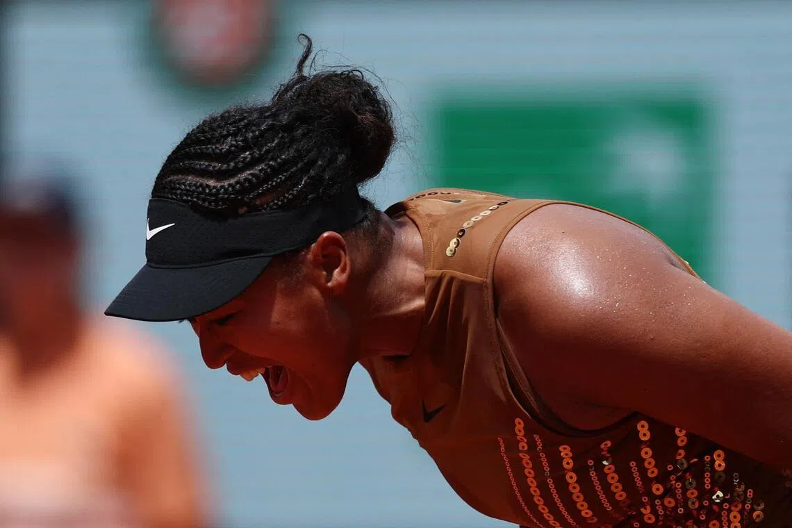 Japan's Naomi Osaka reacting during her 7-6 (7-5), 6-7 (3-7), 6-4 third-round win over Iva Jovic of the US at the French Open at Roland Garros in Paris on May 30, 2026.