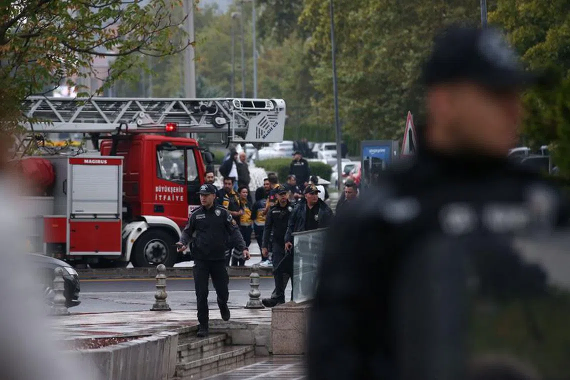 Police officers secure an area near the Interior Ministry following a bomb attack in Ankara, Turkey October 1, 2023. REUTERS/Cagla Gurdogan
