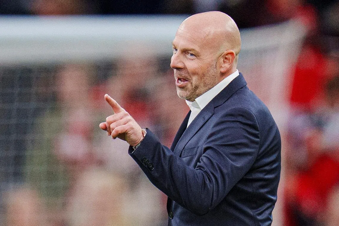 Soccer Football - International Friendly - Denmark v Northern Ireland - Parken, Copenhagen, Denmark - June 7, 2025 Denmark coach Brian Riemer celebrates after the match  Liselotte Sabroe/Ritzau Scanpix via REUTERS/ File Photo
