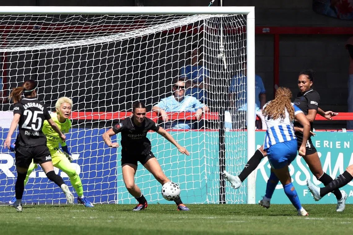 Soccer Football - Women's Super League - Brighton & Hove Albion v Manchester City - Broadfield Stadium, Crawley, Britain - April 25, 2026 Brighton & Hove Albion's Madison Haley scores their first goal Action Images via Reuters/Cat Goryn