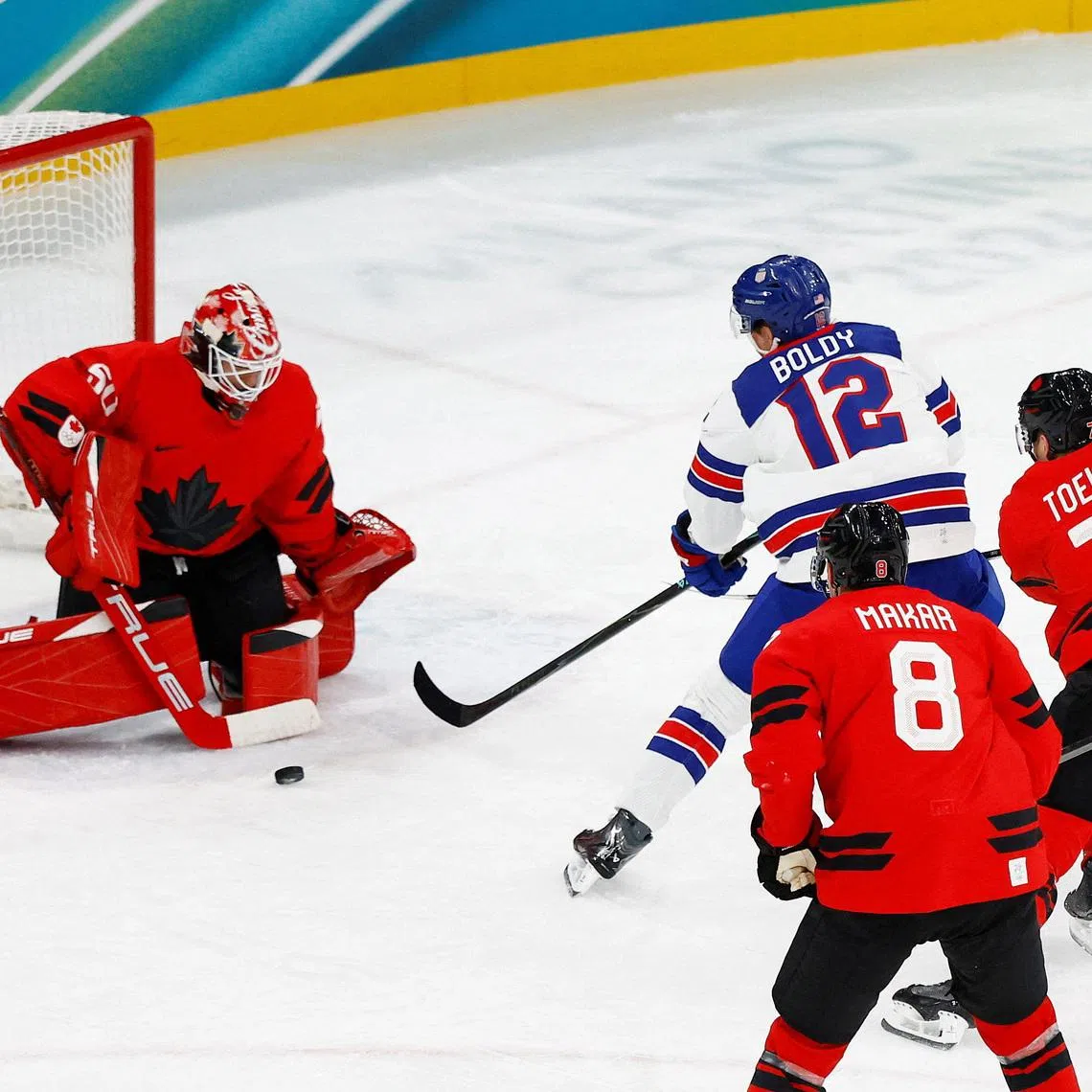Milano Cortina 2026 Olympics - Ice Hockey - Men's Gold Medal Game - Canada vs United States - Milano Santagiulia Ice Hockey Arena, Milan, Italy - February 22, 2026. Matt Boldy of United States scores their first goal REUTERS/Alessandro Garofalo