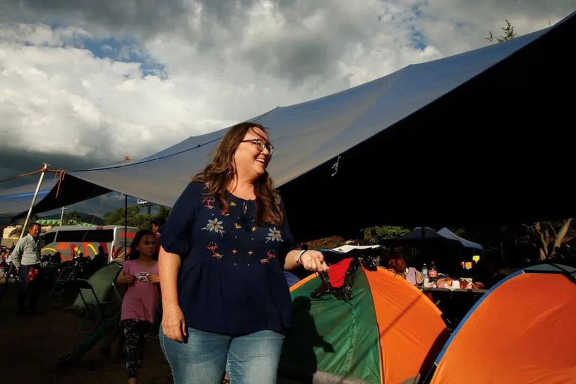 Midwife Leticia Serrano walks at a makeshift migrant shelter where she checks on pregnant women, in San Sebastian Tutla, Oaxaca, October 19, 2023. REUTERS/Jorge Luis Plata