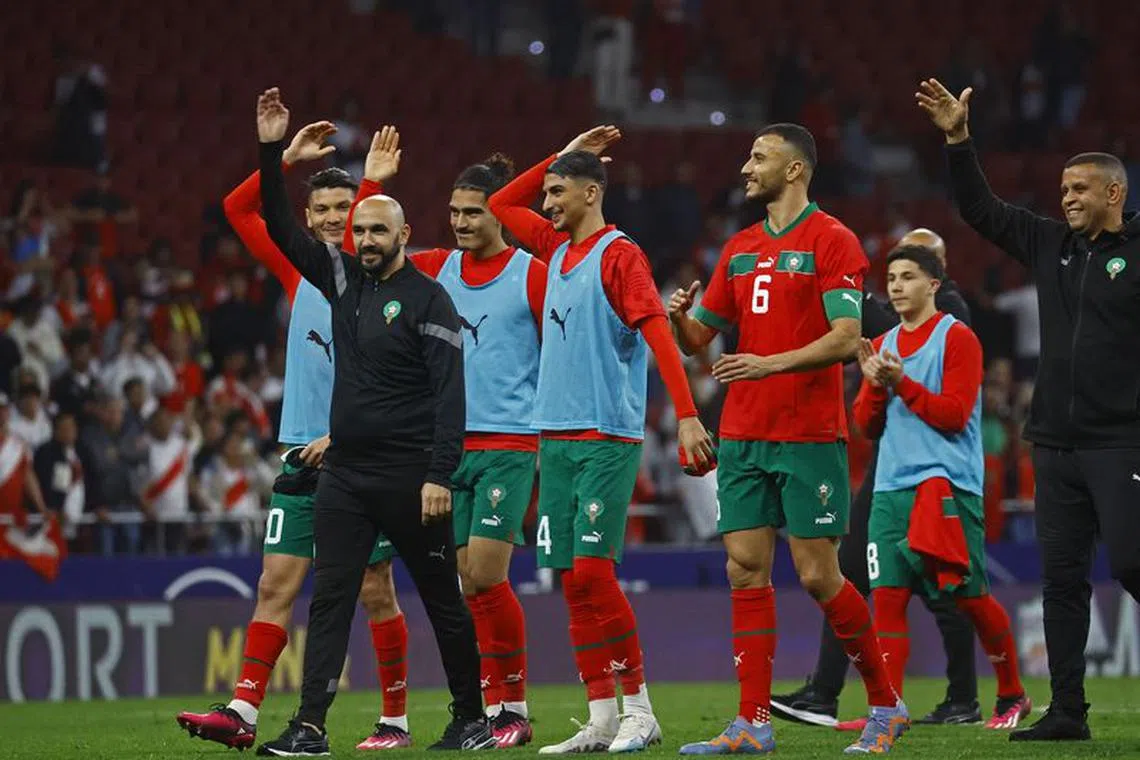 Soccer Football - International Friendly - Morocco v Peru - Metropolitano, Madrid, Spain - March 28, 2023 Morocco coach Walid Regragui with players after the match REUTERS/Susana Vera/ File Photo