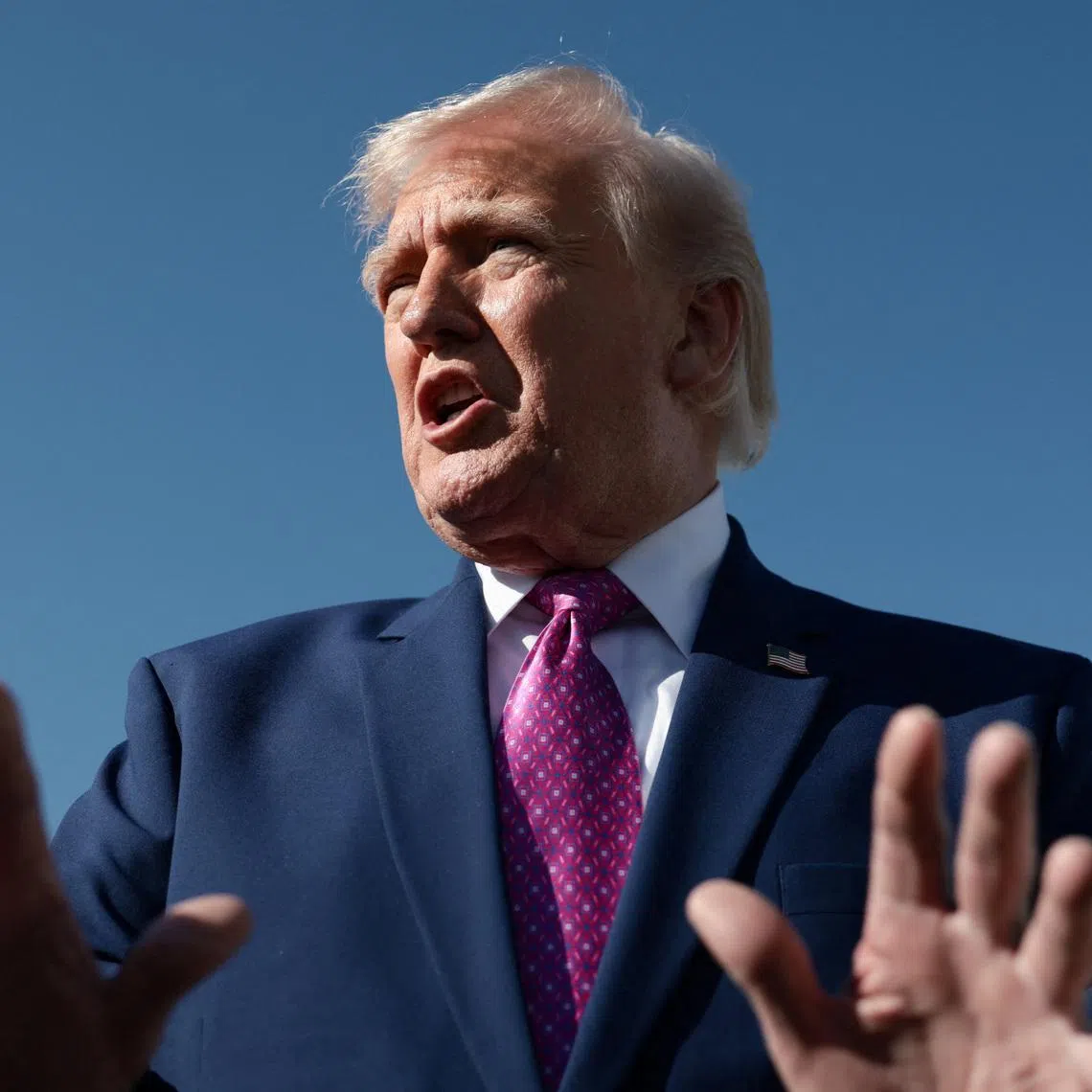 U.S. President Donald Trump speaks to the media, before boarding Air Force One on his way to Virginia, at Joint Base Andrews in Maryland, U.S., April 10, 2026. REUTERS/Evelyn Hockstein