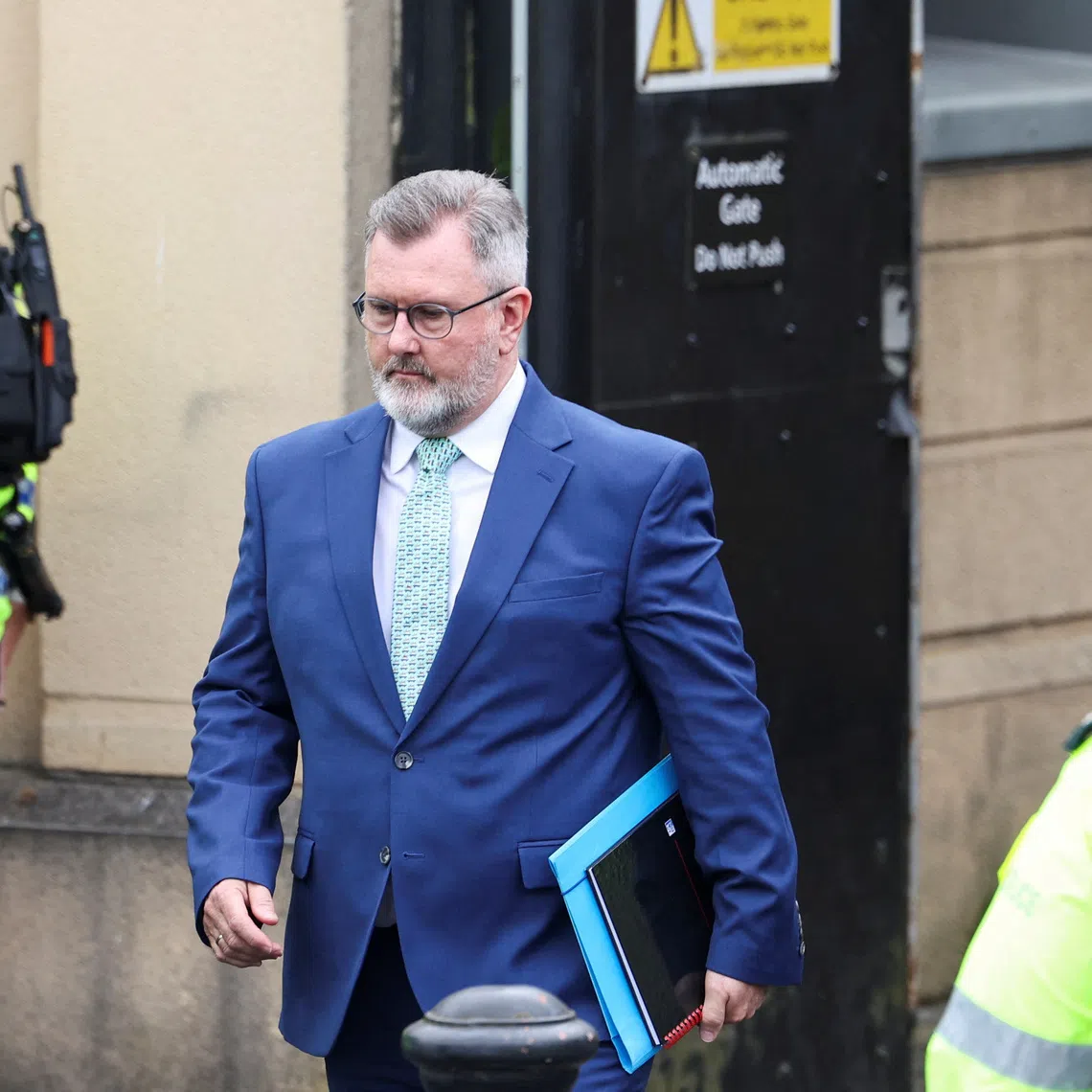 Jeffrey Donaldson, former leader of the Democratic Unionist Party (DUP) charged with historical sex offences, leaves the Newry Magistrates Court after a preliminary enquiry, in Newry, Northern Ireland, July 3, 2024. REUTERS/Damien Eagers