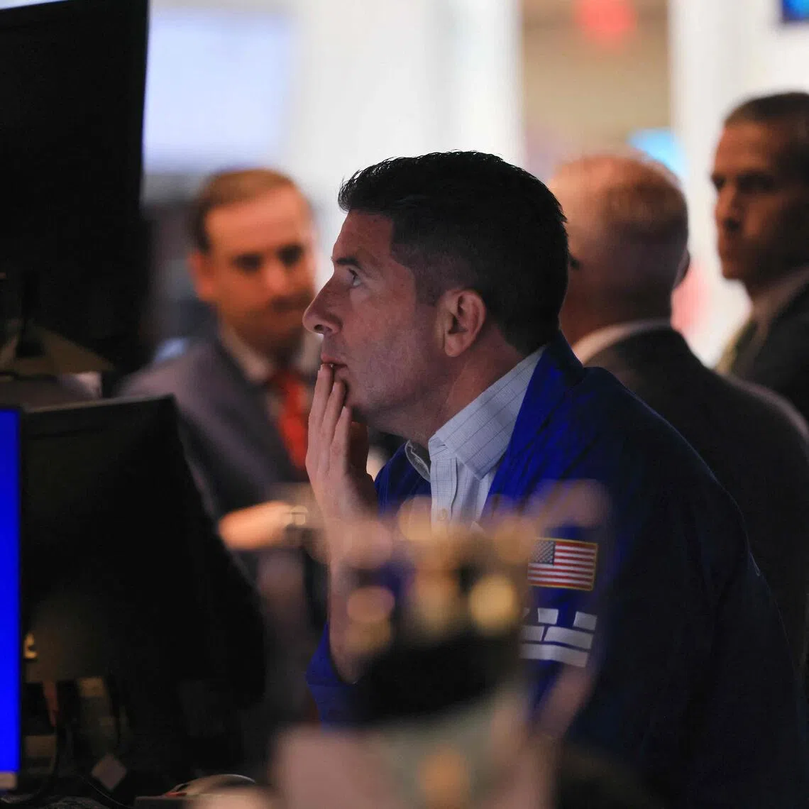 Traders working on the floor of the New York Stock Exchange on Sept 9, in New York City.