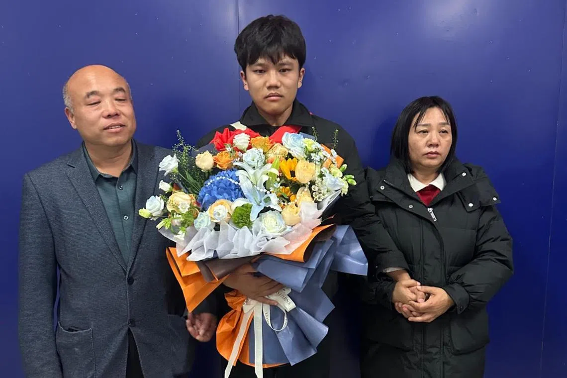 Mr Xie Kefeng and his wife reunited with their son after 25 years.