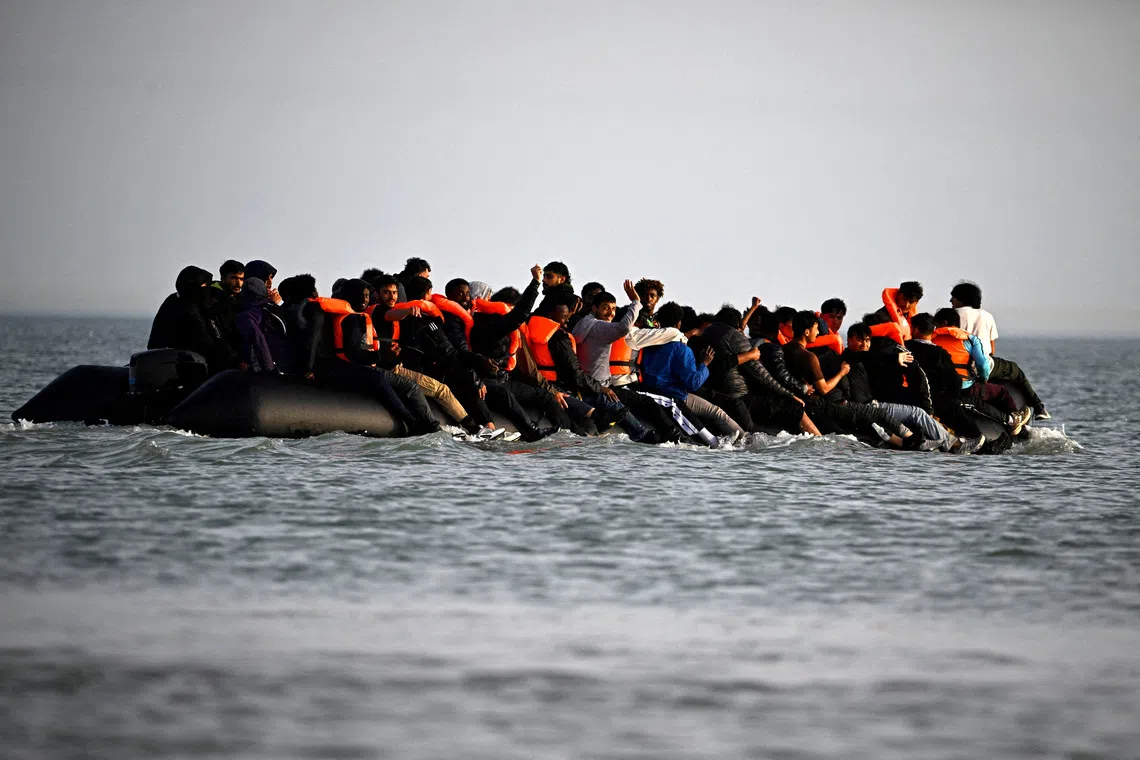 Migrants leaving the coast of northern France in an attempt to cross the English Channel to reach Britain in May.