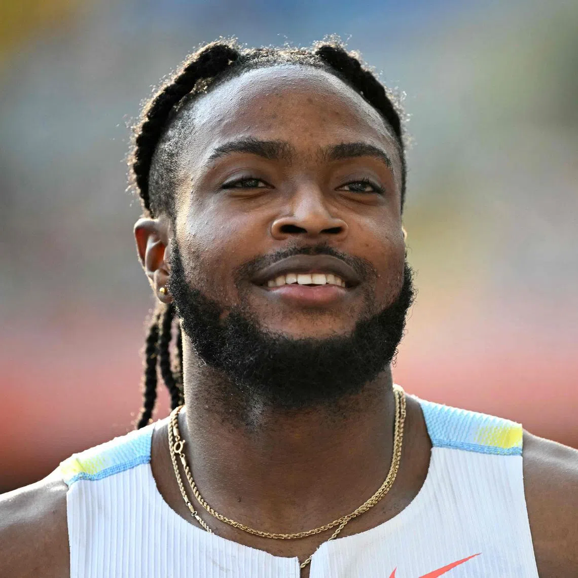 Jamaica's Kishane Thompson celebrates his win in the men's 100m final.