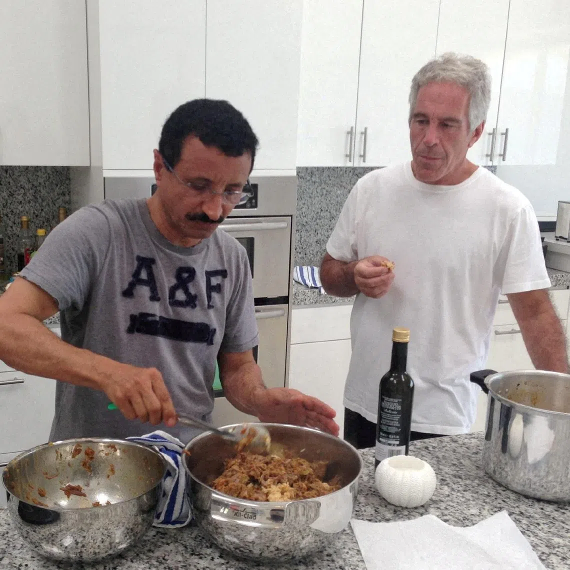 Dubai port giant DP World's former chief executive Sultan Ahmed Bin Sulayem, seen in this undated image with disgraced financier Jeffrey Epstein.