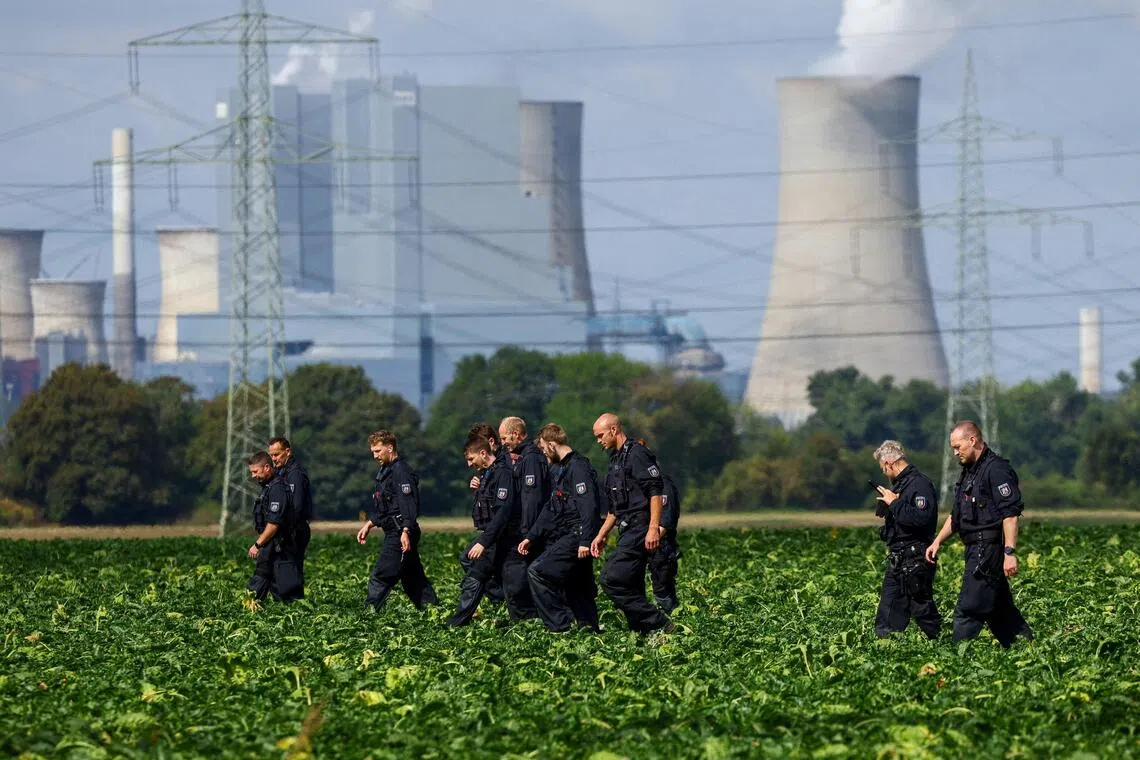 German police officers carrying out searches on Sept 2, after a sabotage attempt on Germany’s electricity grid.