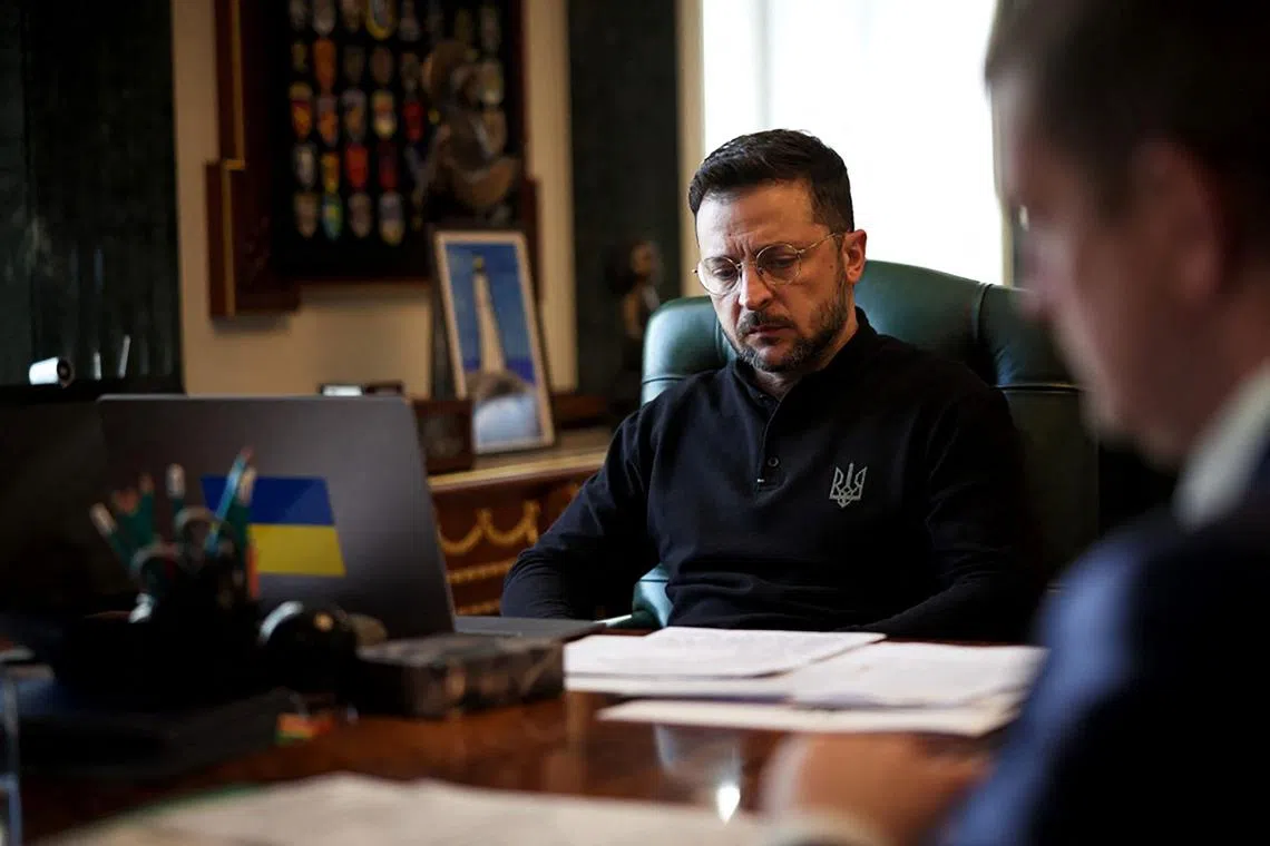 In this handout photograph taken and released by the Ukrainian Presidential Press Service on April 21, 2025, Ukraine's President Volodymyr Zelensky waits for a phone call with Britain's Prime Minister Keir Starmer as he sits at his desk in his office in Kyiv, amid the Russian invasion of Ukraine. (Photo by Handout / UKRAINIAN PRESIDENTIAL PRESS SERVICE / AFP) / RESTRICTED TO EDITORIAL USE - MANDATORY CREDIT "AFP PHOTO / UKRAINIAN PRESIDENTIAL PRESS SERVICE" - NO MARKETING NO ADVERTISING CAMPAIGNS - DISTRIBUTED AS A SERVICE TO CLIENTS