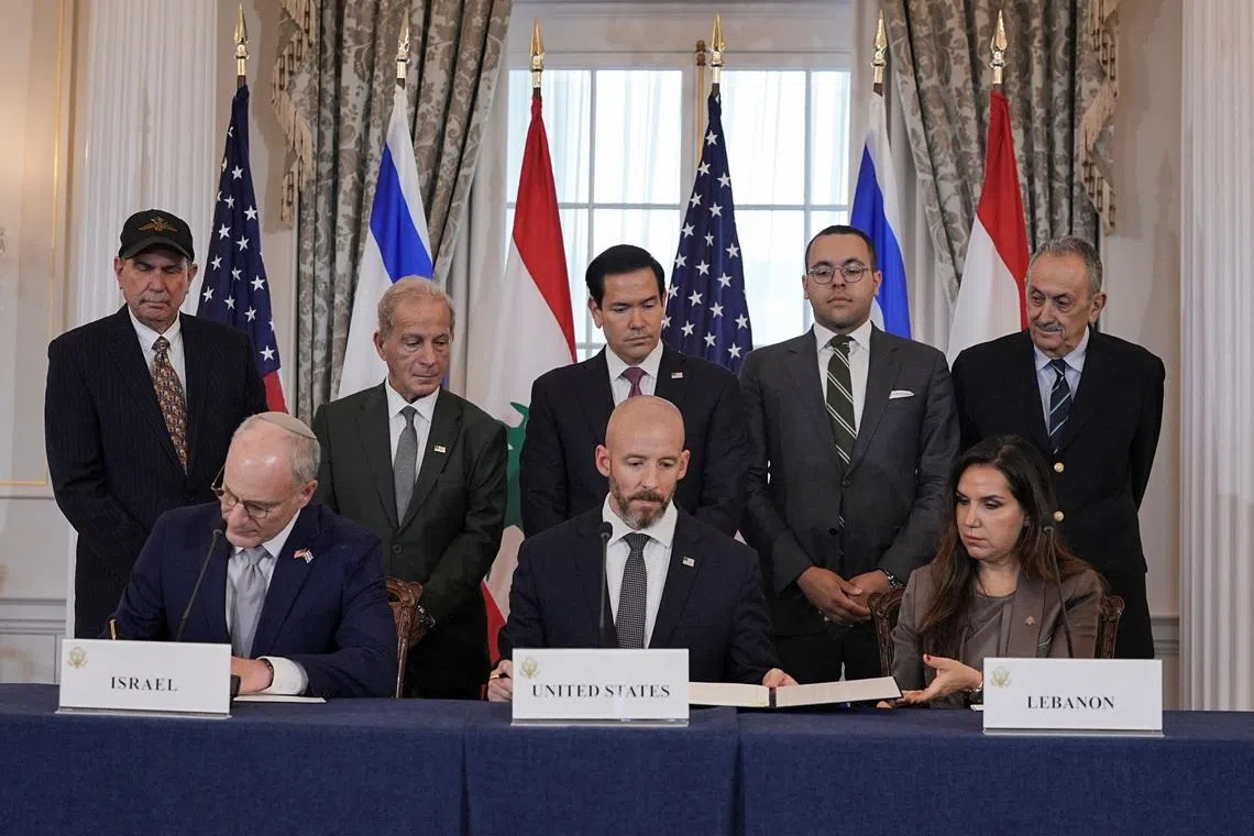 US Secretary of State Marco Rubio looking on as State Department Counsellor Daniel Holler, Israel’s Ambassador to the US Yechiel Leiter and Lebanon’s Ambassador to the US Nada Hamadeh sign the framework deal in the US on June 26.