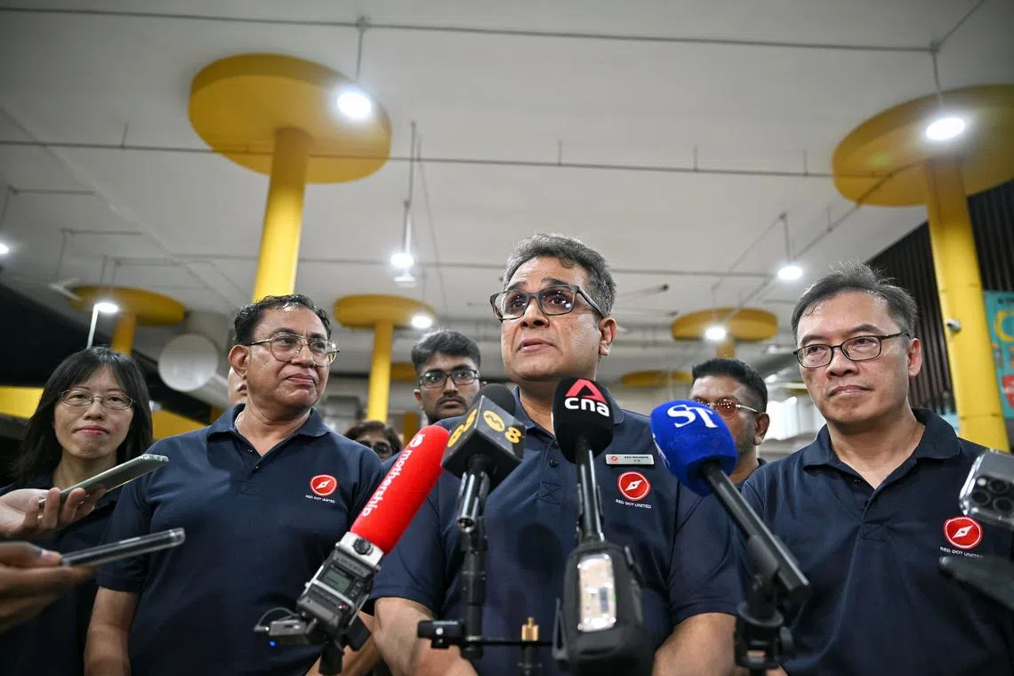 Red Dot United secretary-general Ravi Philemon speaking to the media before a walkabout at Yishun Park Hawker Centre on Apr 3, 2025.