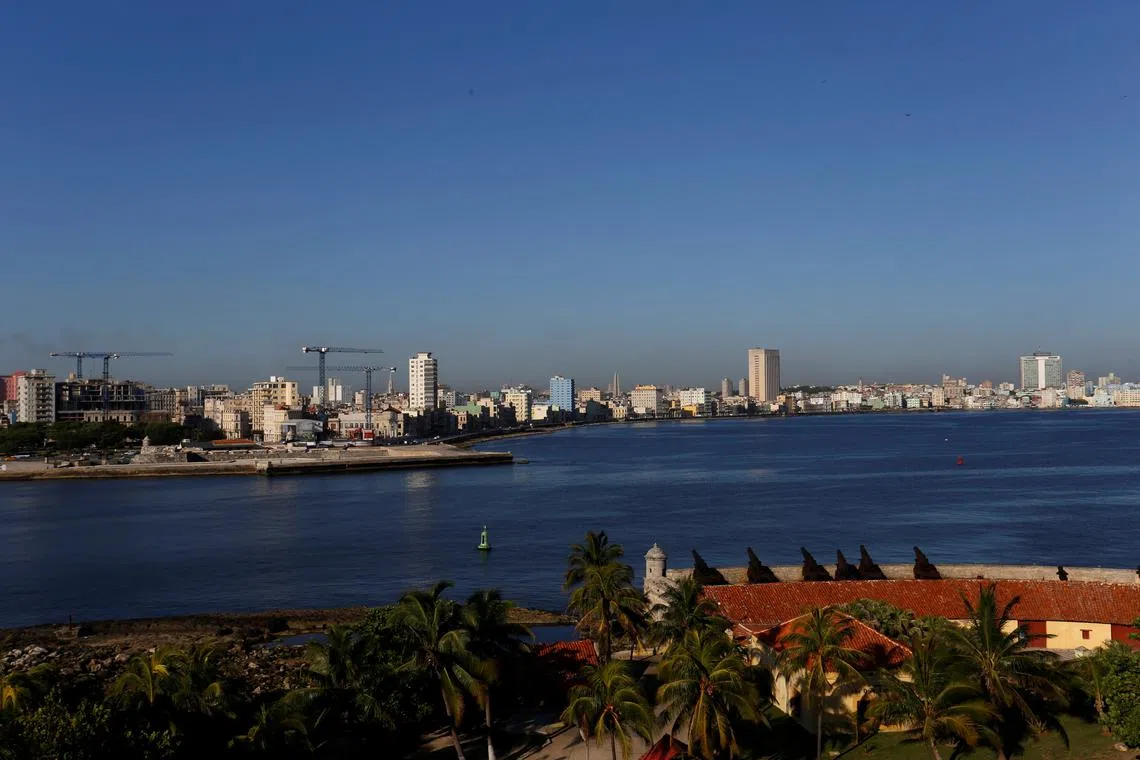 Cranes dot the skyline as the building of luxury hotels and the renovation of historic buildings are underway, in Havana, Cuba May 16, 2017. Picture taken May 16, 2017. REUTERS/Stringer/File Photo