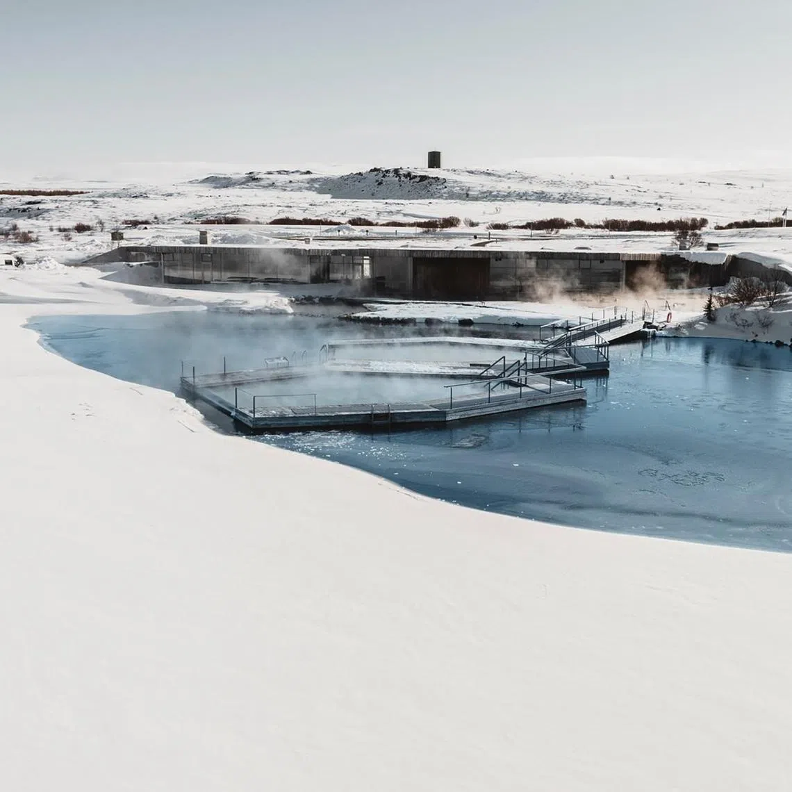 ssiceland - Vok Baths has three floating pools of varying temperatures up to 41 deg C, where bathers mingle while taking in the panoramic views over Lake Urrioavatn.

PHOTO: VOK BATHS/FACEBOOK