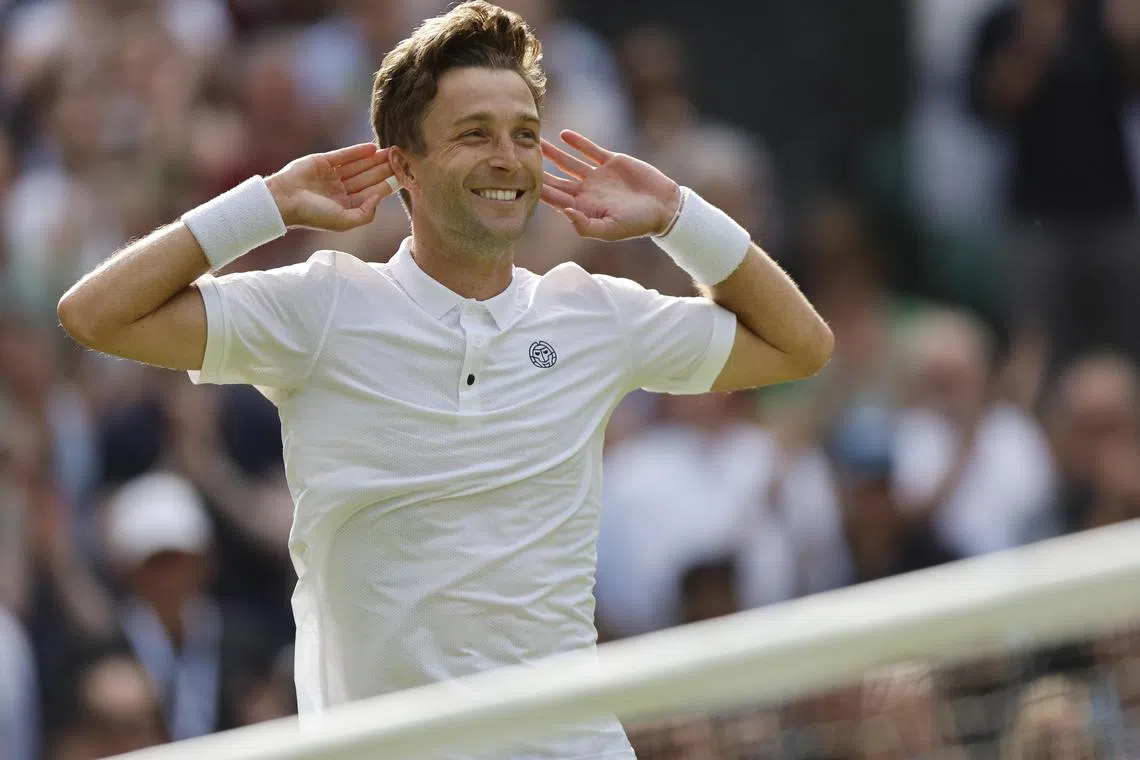 Britain's Liam Broady celebrates his win against Norway's Casper Ruud.