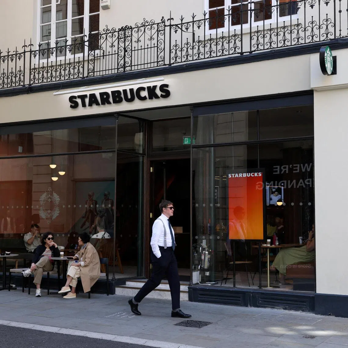 Starbucks said new chicken wraps, blue coconut beverages and its line of iced fruit drinks with customisable levels of caffeine attracted customers. 