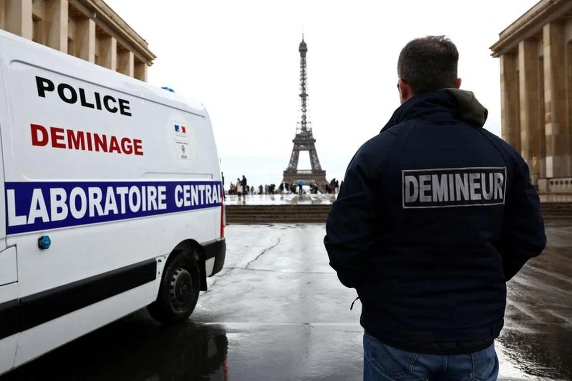 FILE PHOTO: Frederic, member of Paris police bomb squad, intervenes at the Trocadero Square near the Eiffel Tower in Paris as the bomb-disposal team gear up for heightened security operations for Paris 2024 Olympic and Paralympic Games, France, December 4, 2023. REUTERS/Stephanie Lecocq/File Photo