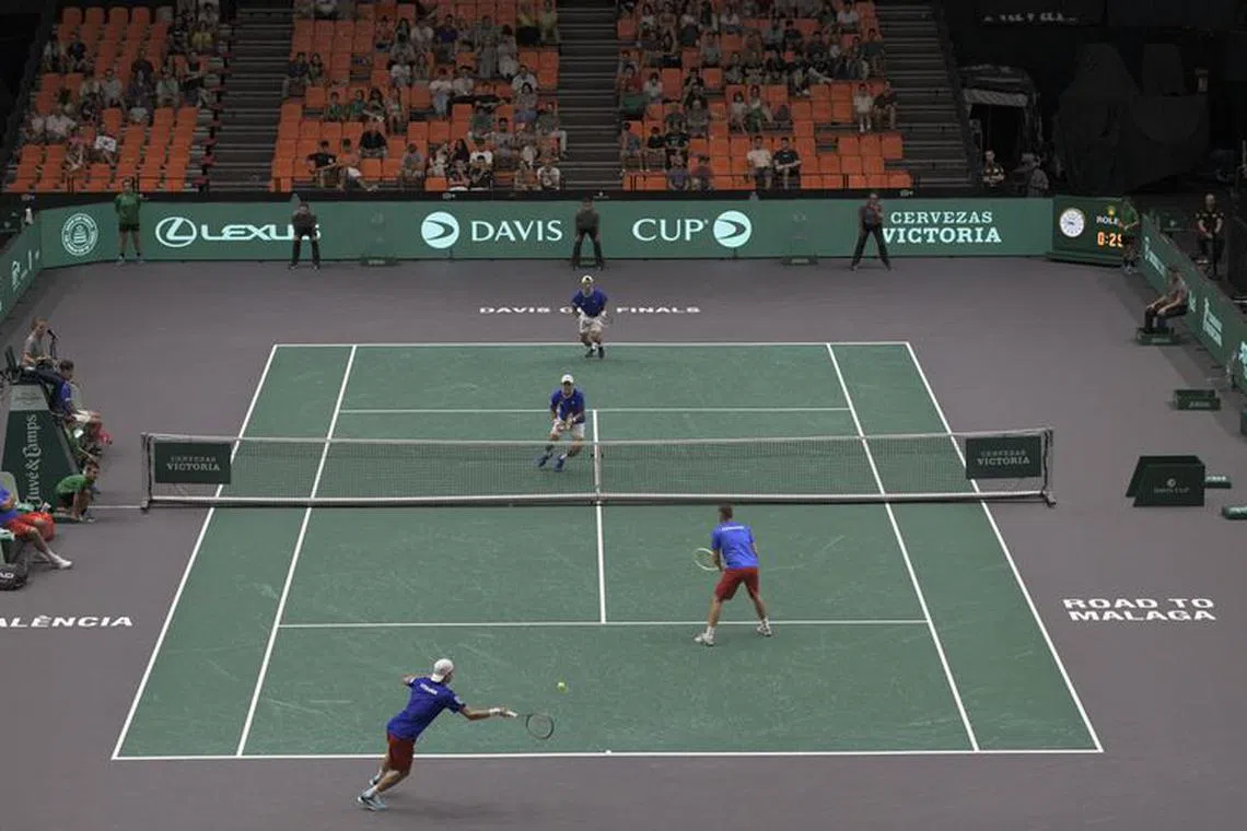 Tennis - Davis Cup - Finals - Czech Republic v South Korea - Pabellon Fuente de San Luis, Valencia, Spain - September 14, 2023  South Korea's Ji Sung Nam and Min-kyu Song in action during their match against Czech Republic's Jakub Mensik and Adam Pavlasek REUTERS/Pablo Morano/File photo
