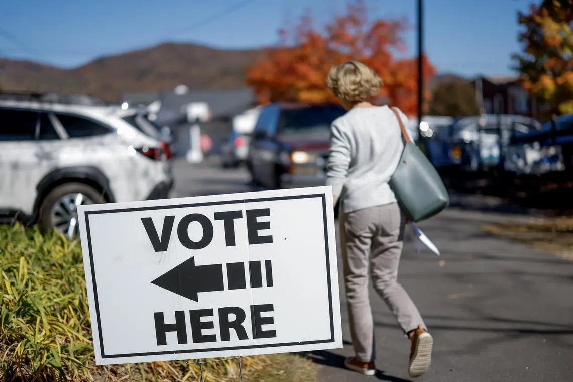 A voter in North Carolina arriving to cast her ballot, during early voting for the US presidential election, on Oct 21.