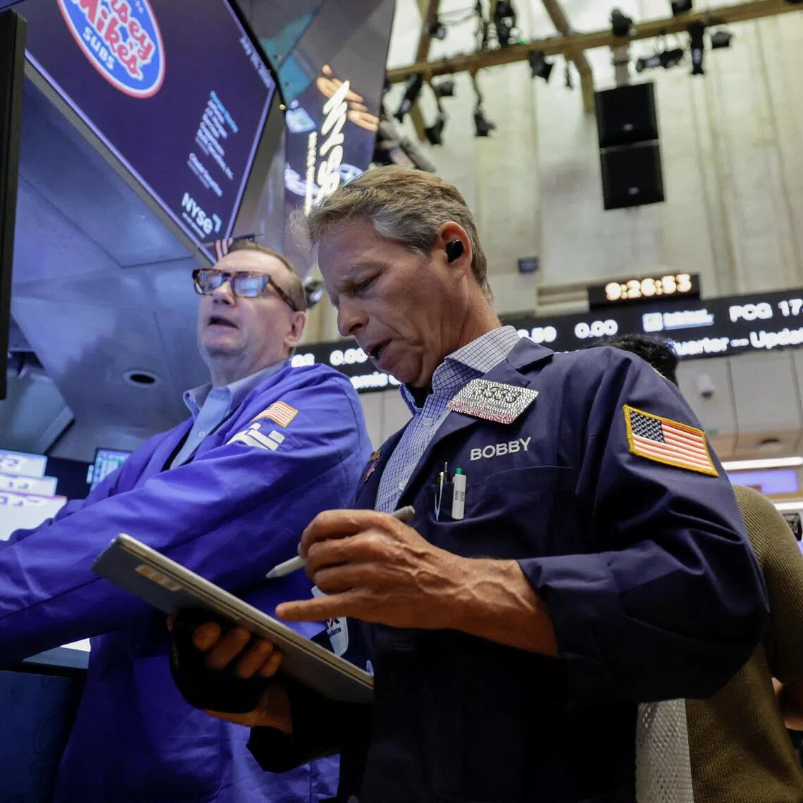 Traders working on the floor of the New York Stock Exchange, in New York City, on July 30.