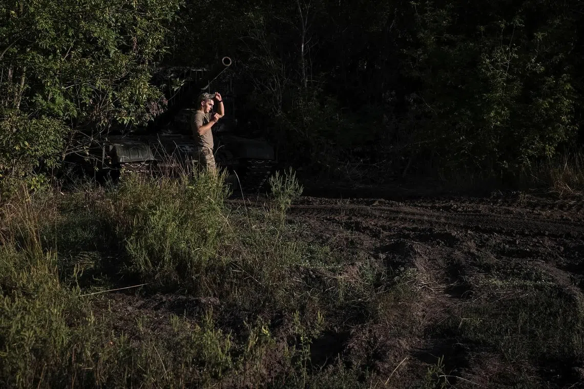 FILE PHOTO: A serviceman of the 141st Separate Mechanized Brigade of the Ukrainian Armed Forces prepare a tank to fire towards Russian troops, at a position near a front line, amid Russia's attack on Ukraine, in Donetskk region, Ukraine September 3, 2025. REUTERS/Stringer/File Photo