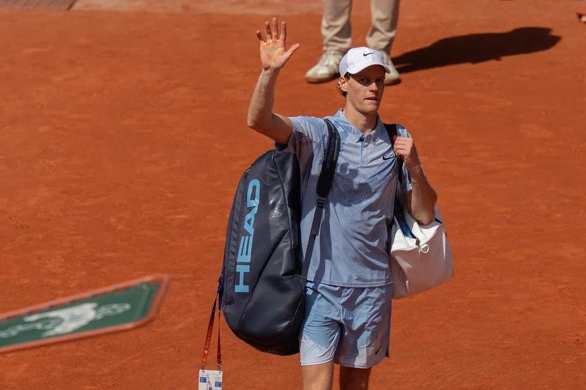 May 28, 2026; Paris, France; Jannik Sinner of Italy leaves the court after losing his match against Juan Manuel Cerundolo of Argentina on day five at Stade Roland Garros. Mandatory Credit: Susan Mullane-Imagn Images
