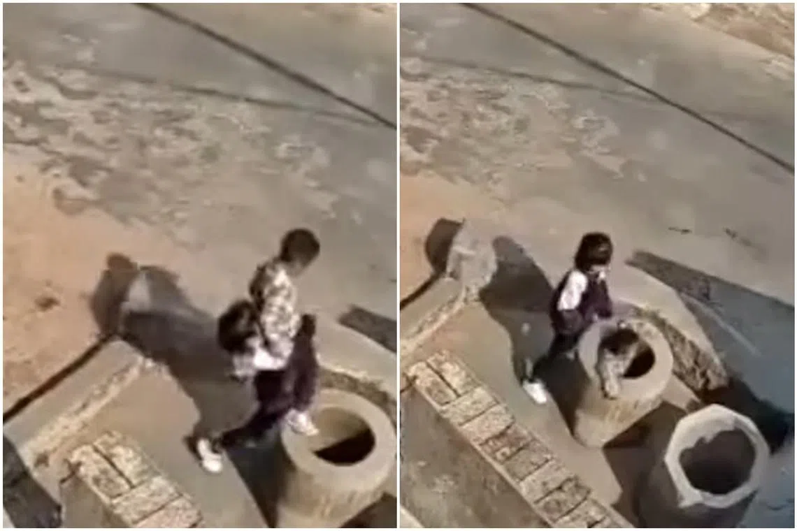 The girl is seen carrying a boy and dropping him into a well in a village in Yunnan’s Songming county.