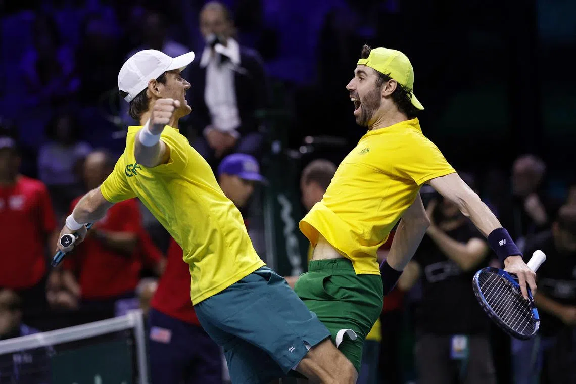 Australia's Jordan Thompson and Matthew Ebden celebrate winning their doubles match against Ben Shelton and Tommy Paul of the US.