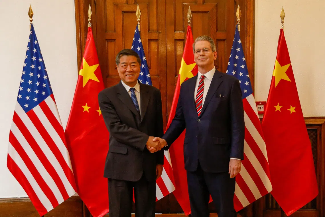 Chinese Vice-Premier He Lifeng (left) meeting US Treasury Secretary Scott Bessent for talks in Madrid on Sept 14.