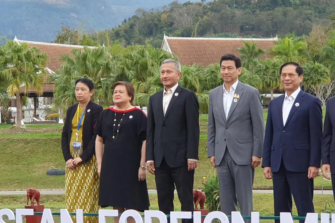 Ms Marlar Than Htaik (left), permanent secretary of the Foreign Ministry under the control of Myanmar’s junta, at the Asean Foreign Ministers’ Retreat in Laos on Jan 29. Singapore Foreign Minister Vivian Balakrishnan (third from left) was also at the retreat.