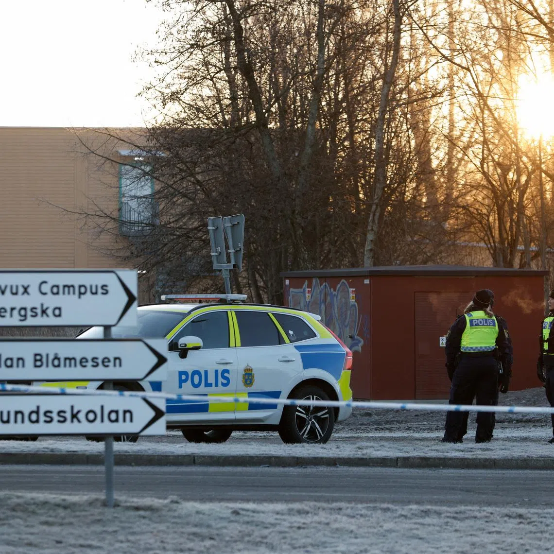 Police officers stand near the Risbergska school, following a deadly shooting attack at the adult education centre, in Orebro, Sweden, February 7, 2025. REUTERS/Kuba Stezycki