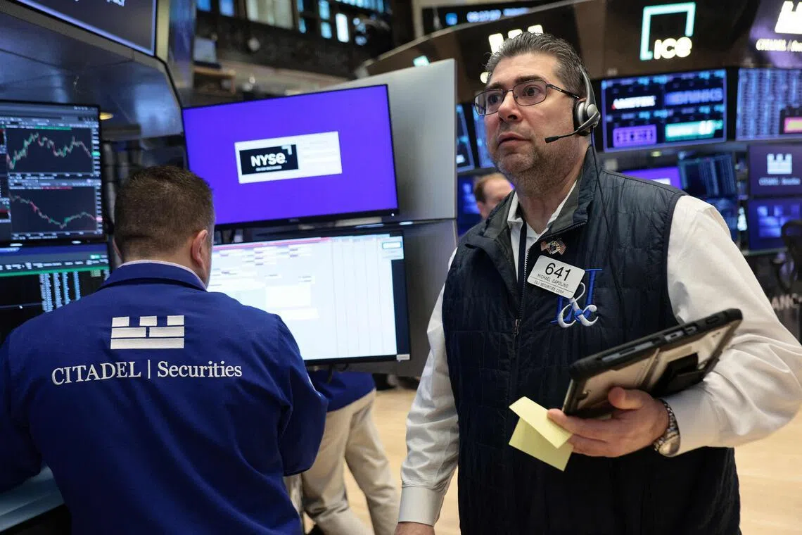 Nasdaq confirms correction, Wall Street slumps on Middle East uncertainty