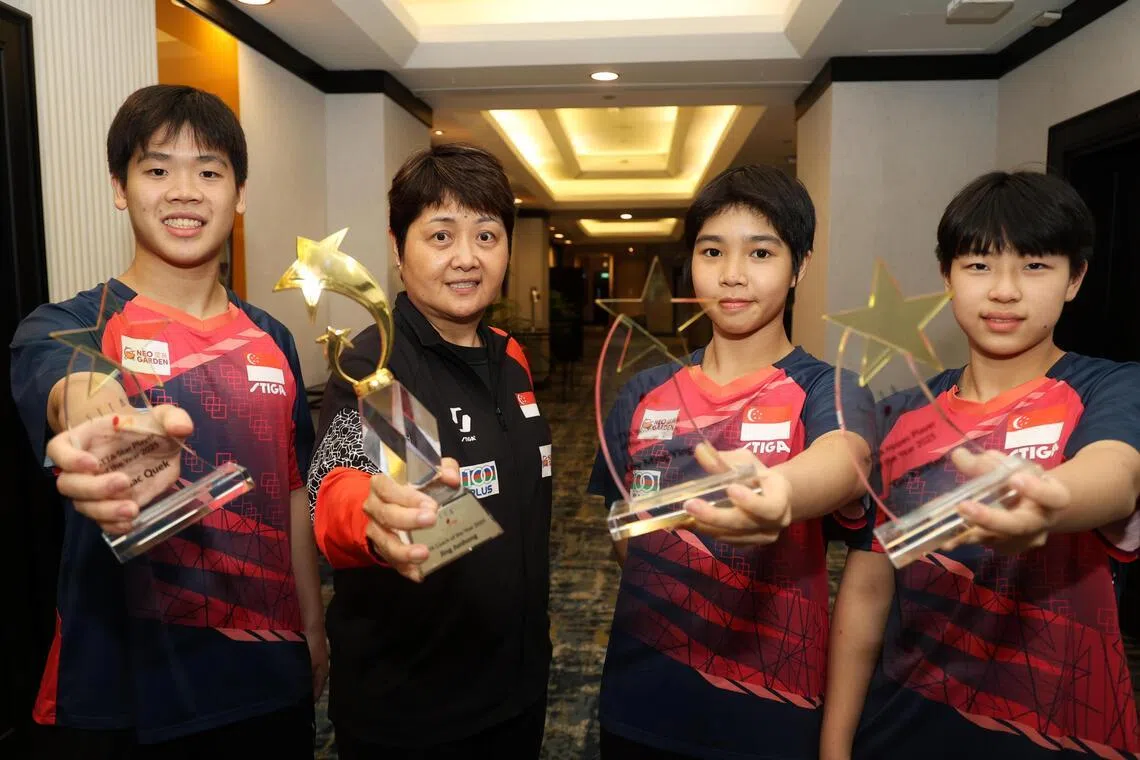 From left: Star Player of the Year Izaac Quek, Coach of the Year Jing Junhong, Youth Player of the Year Loy Ming Ying and Hopes Player of the Year Gu Xin Tian with their trophies at the STTA Annual Awards Night on May 11.