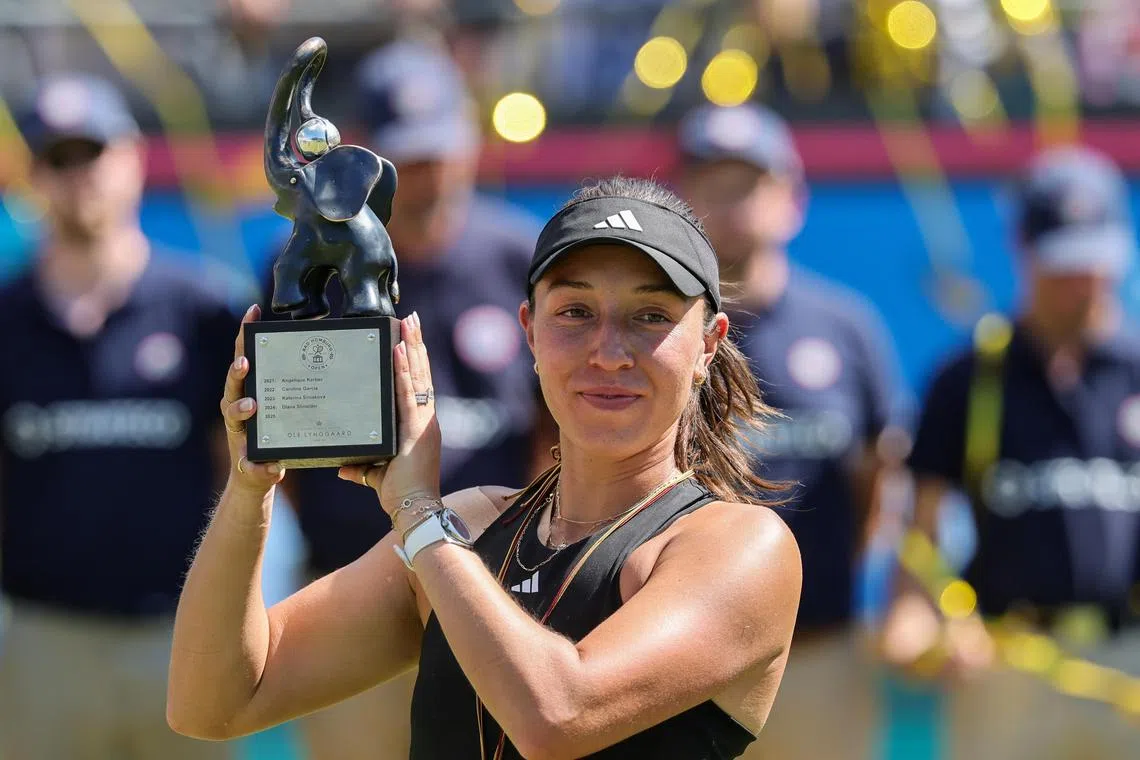 Jessica Pegula of the US celebrating with her trophy after beating Iga Swiatek of Poland 6-4, 7-5 victory on June 28 to lift the 2025 Bad Homburg Open title.