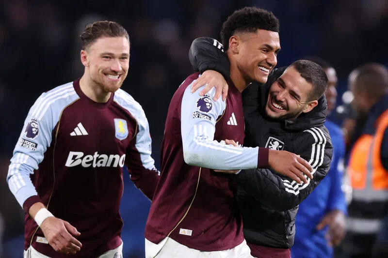 Aston Villa's Ollie Watkins, Emiliano Buendia and Matty Cash celebrate after the match.