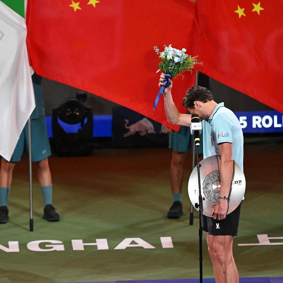 Emotional cousins: France’s Arthur Rinderknech (right) on stage with Monaco's Valentin Vacherot after the Shanghai Masters final.