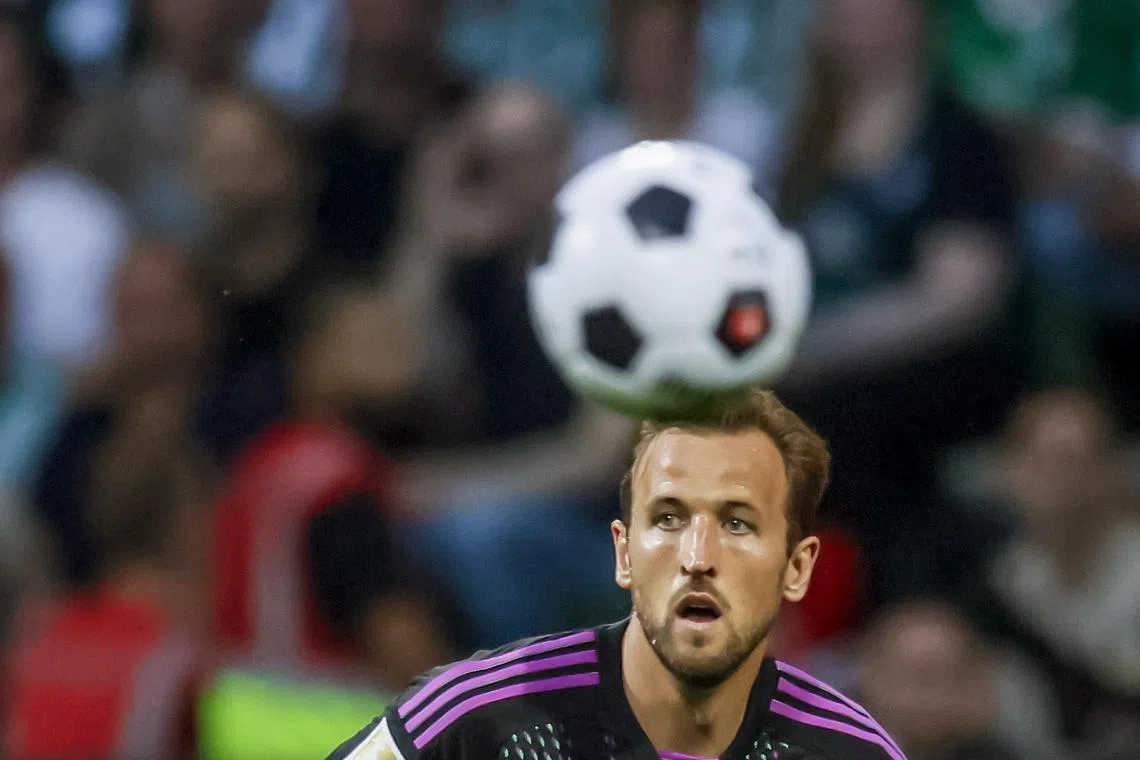 Bayern signed England captain Harry Kane for a Bundesliga record €100 million (S$148 million) from Tottenham Hotspur on a four-year deal.