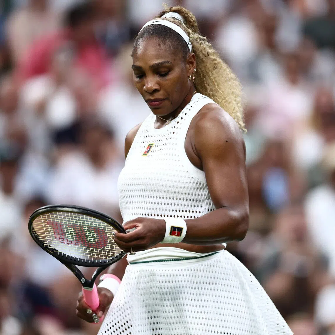 TOPSHOT - US player Serena Williams reacts as she plays against Australia's Maya Joint during their women's singles first round tennis match on the second day of the 2026 Wimbledon Championships at The All England Lawn Tennis and Croquet Club in Wimbledon, southwest London, on June 30, 2026. (Photo by HENRY NICHOLLS / AFP) / RESTRICTED TO EDITORIAL USE