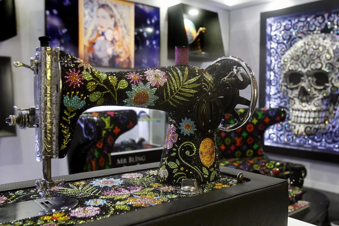 A crystal-covered sewing machine by Colombian artist Mauricio Benitez, also known as 'Mr. Bling,' on display at the 35th Colombiatex in Medellin, Colombia.