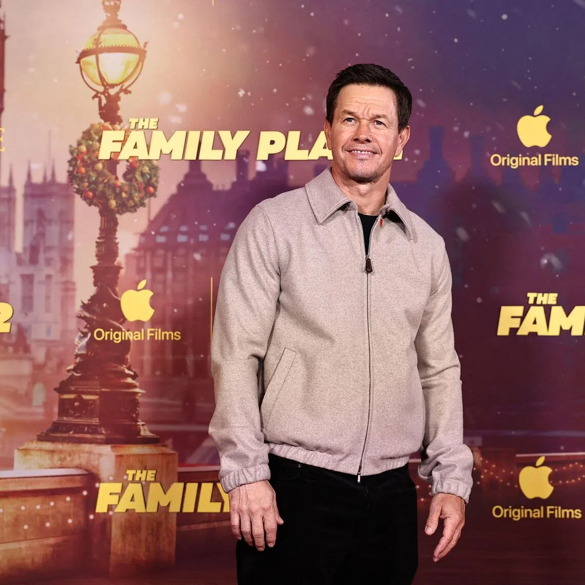US actor Mark Wahlberg poses on the red carpet on arrival to attend the world premiere for the film "The Family Plan 2" in London on November 11, 2025. (Photo by HENRY NICHOLLS / AFP)