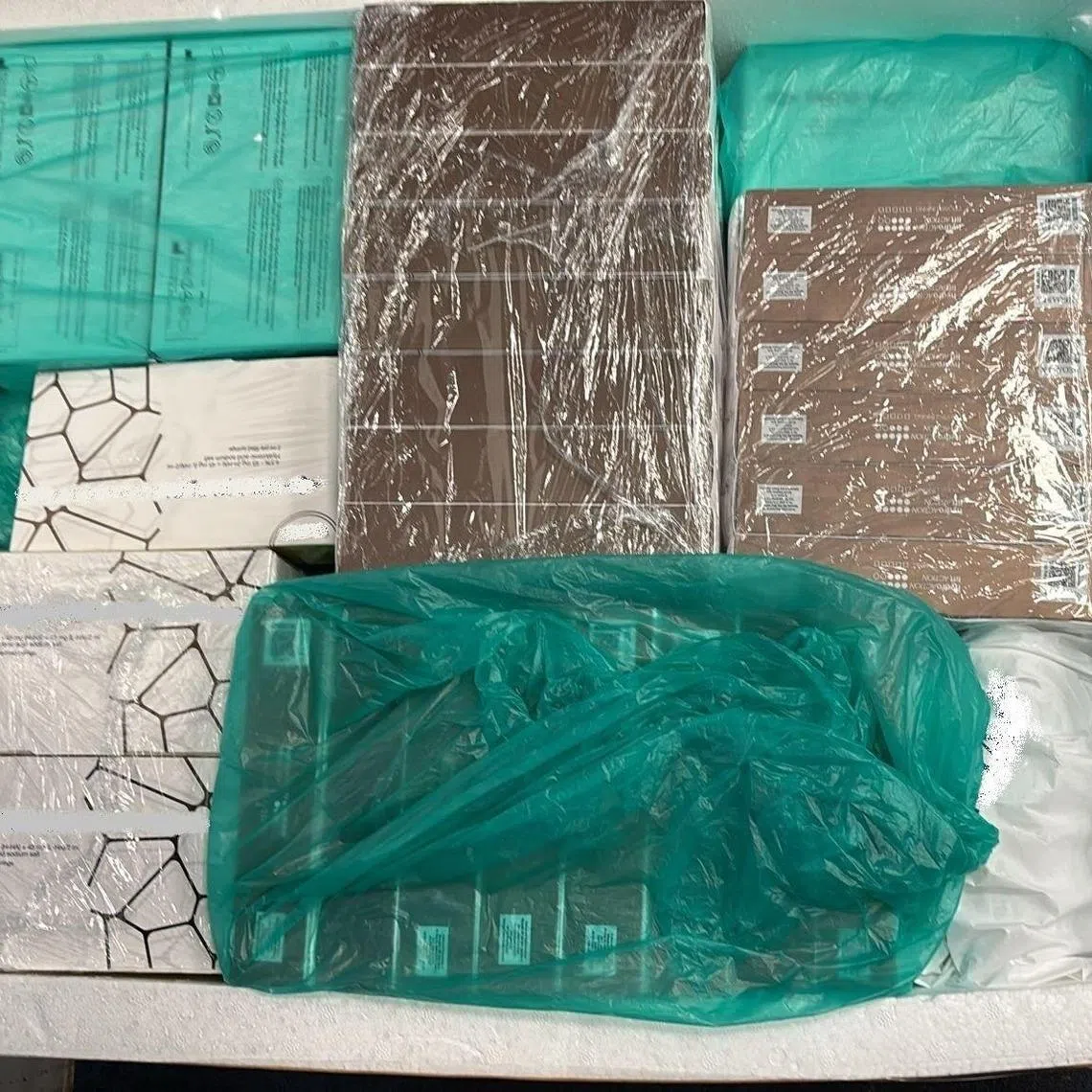 Dermal fillers seized during the raid. Prescription medication and anti-parasitic drugs made up the bulk of the seizures in Singapore.