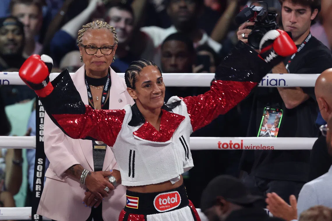 Boxing-Serrano, Manzur trade knockout talk before featherweight title bout