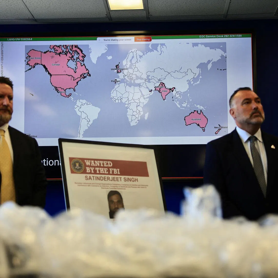 US and Canadian law enforcement officials announce federal charges and arrests of alleged members of a transnational organised crime group on July 7.